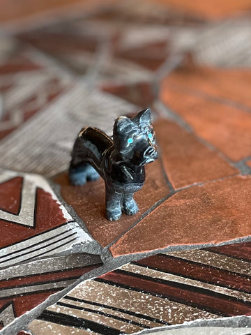 Dog fetish carving