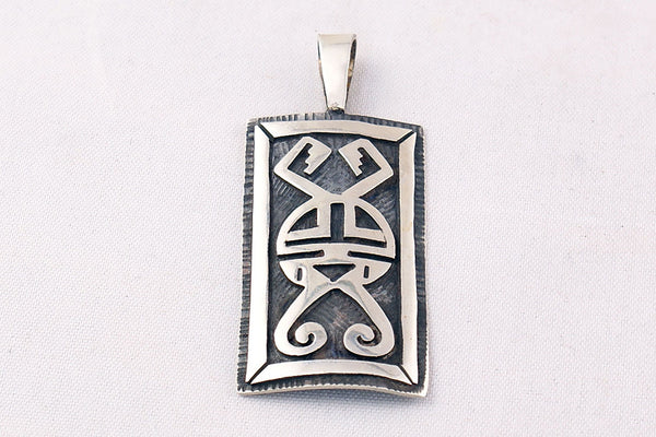 Hopi Overlay Sterling Silver Sunface Pendant by Clement Honie