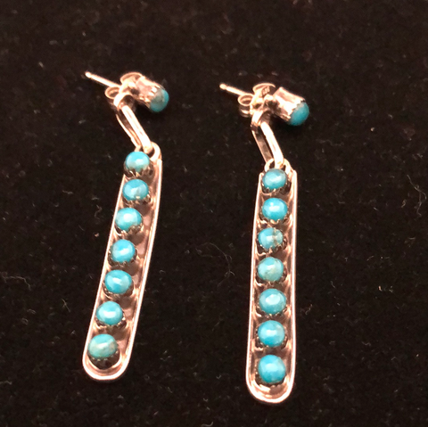 Turquoise dangle earrings by Rena Laate