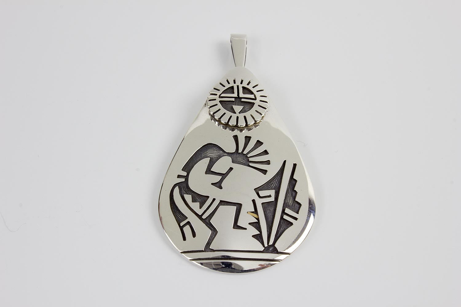 Hopi Sterling Silver Overlay Kokopelli and Sunface Pendant by Floyd Lomakuyvaya