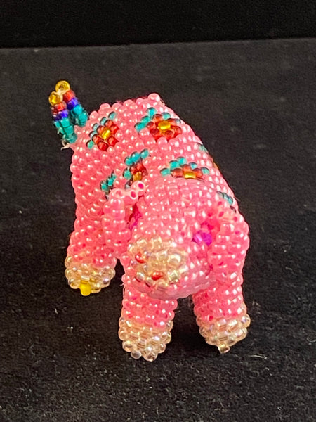 Beaded pig with flowers