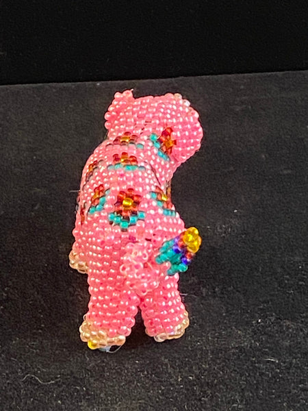 Beaded pig with flowers