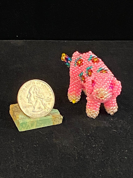 Beaded pig with flowers
