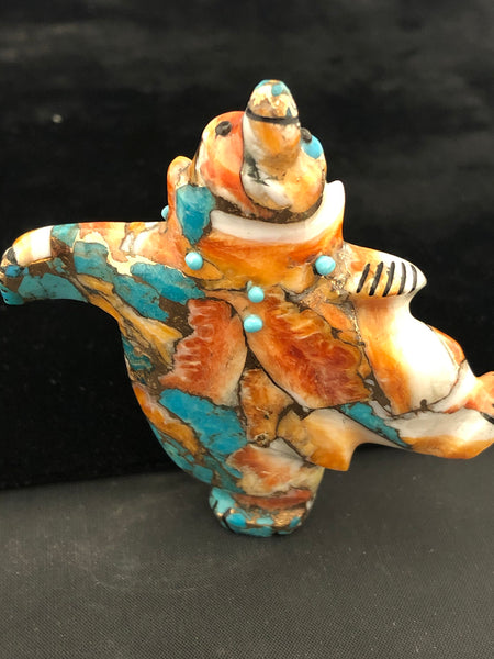 Compressed “dancing bear” carving