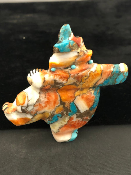 Compressed “dancing bear” carving