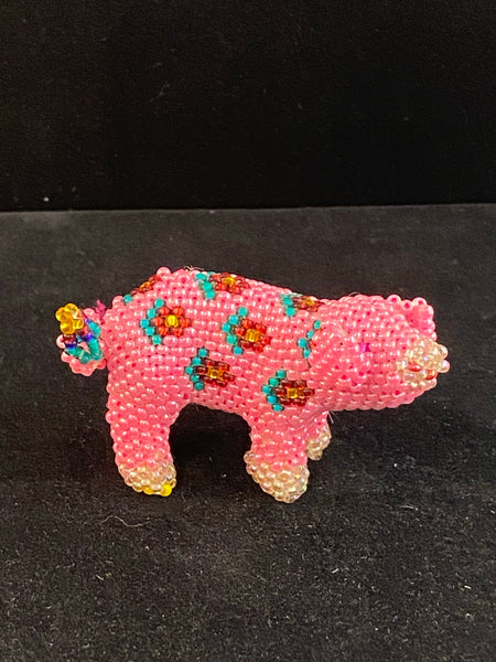 Beaded pig with flowers