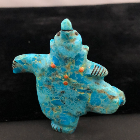 Compressed turquoise “dancing bear” carving