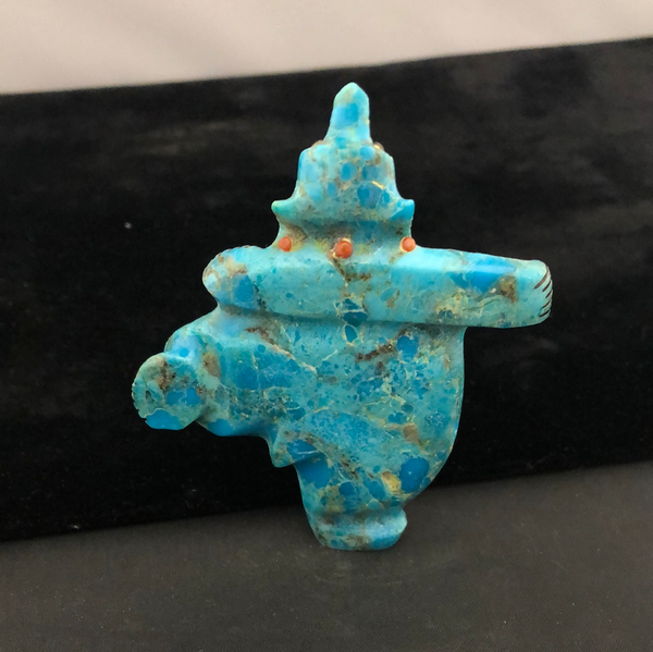 Compressed turquoise “dancing bear” carving