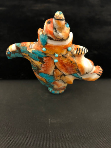 Compressed “dancing bear” carving