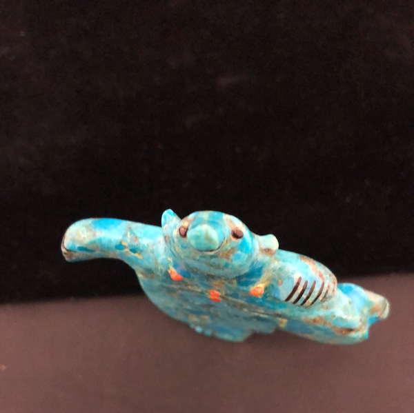 Compressed turquoise “dancing bear” carving
